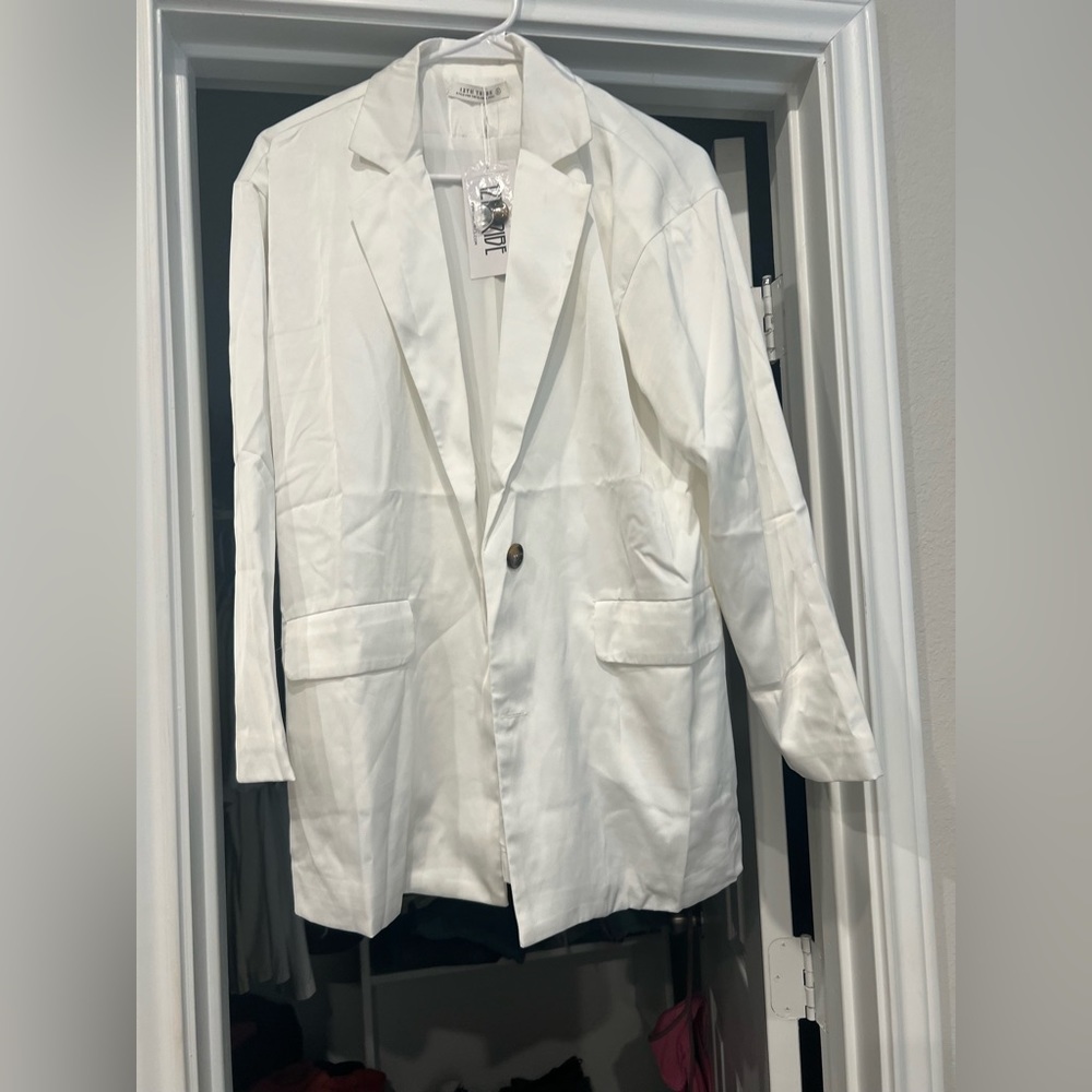 Never worn 12th Tribe satin blazer with tags. Has oversized fit.